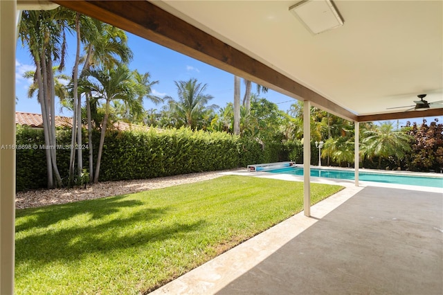 1154 Jefferson St, Hollywood, FL 33019 - view of yard featuring a patio area, a fenced in pool, and ceiling fan