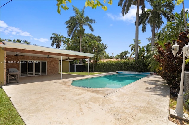 1154 Jefferson St, Hollywood, FL 33019 - view of swimming pool featuring a patio area, a fenced in pool, and ceiling fan