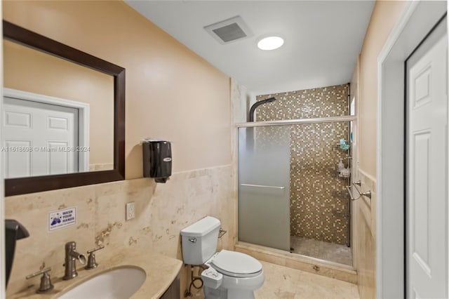 bathroom with walk in shower, tile patterned flooring, vanity, and toilet