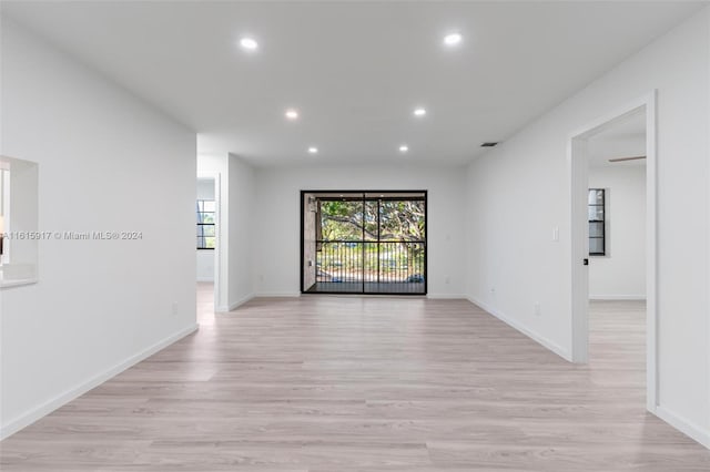 unfurnished room with light hardwood / wood-style flooring