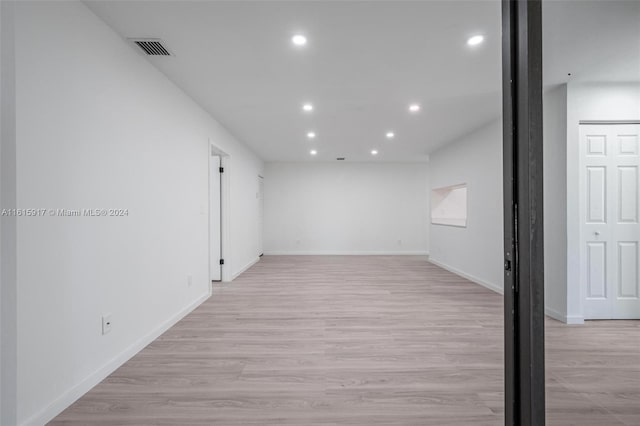 unfurnished room featuring light hardwood / wood-style flooring