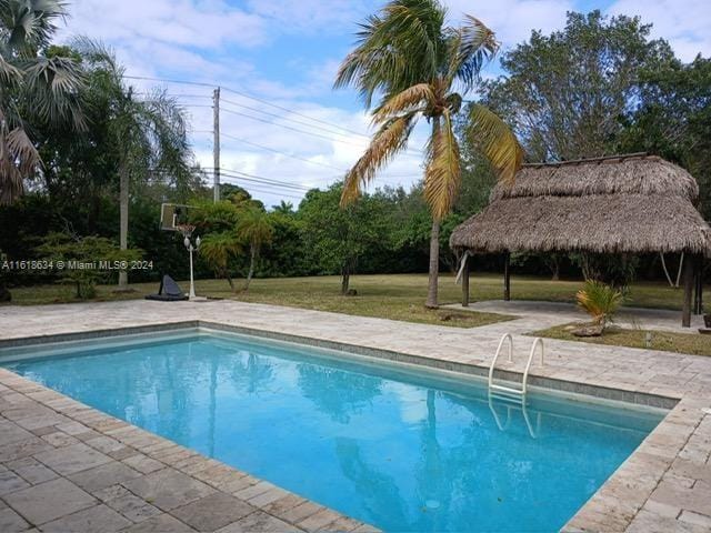 view of pool with a gazebo and a patio