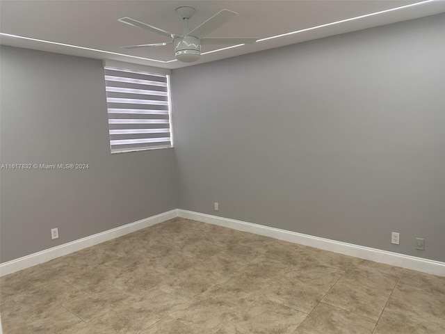 unfurnished room featuring ceiling fan