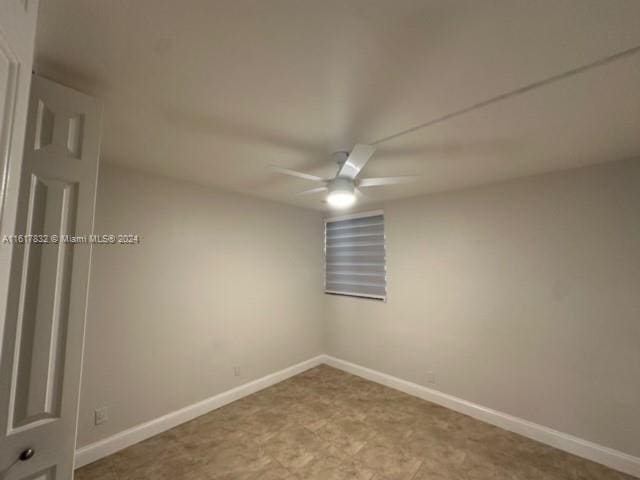 empty room featuring ceiling fan