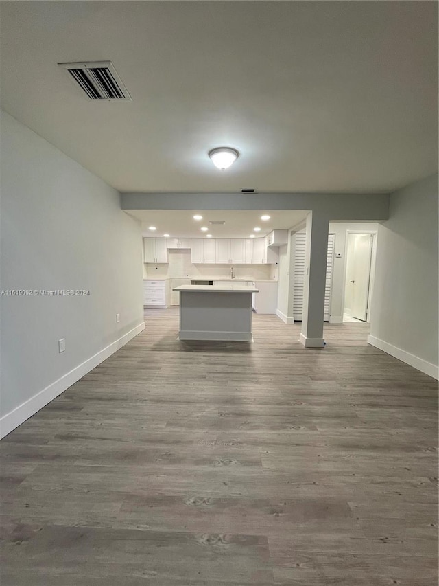 unfurnished living room with light wood-type flooring