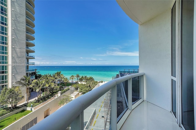 balcony featuring a water view