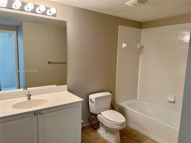 full bathroom featuring tile patterned flooring, shower / bath combination, vanity, and toilet