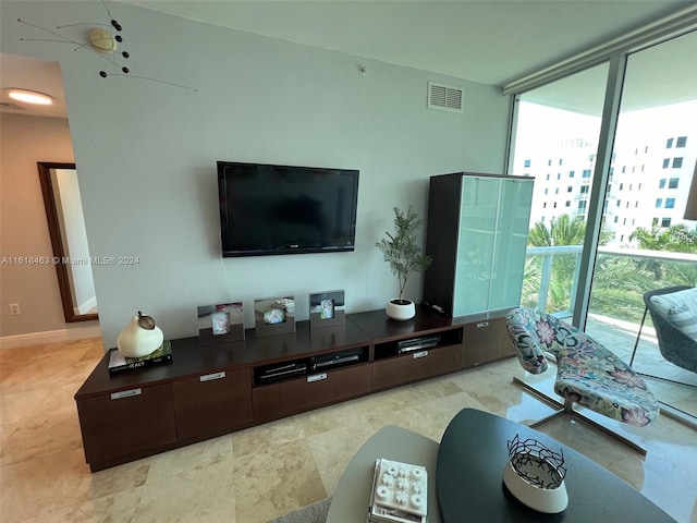 living room with a wall of windows