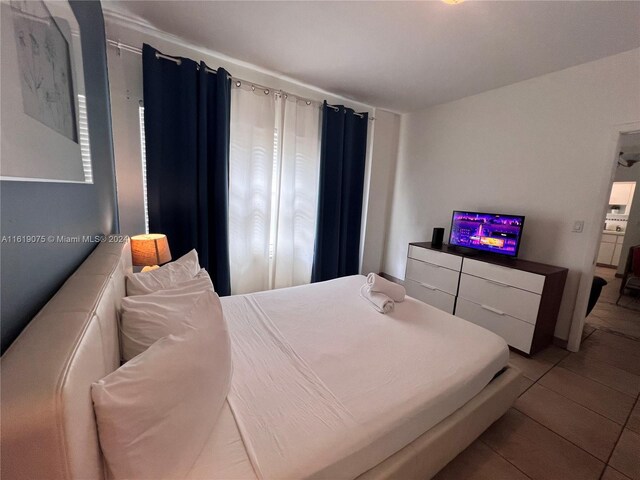 bedroom with tile patterned flooring