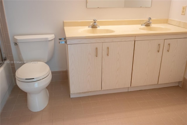 full bathroom with vanity, toilet,  shower combination, and tile patterned flooring