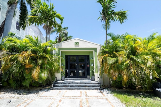 entrance to property featuring french doors