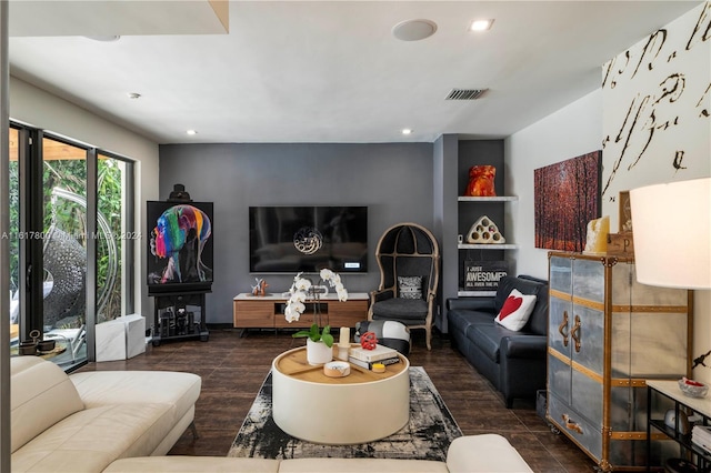 living room featuring dark hardwood / wood-style floors