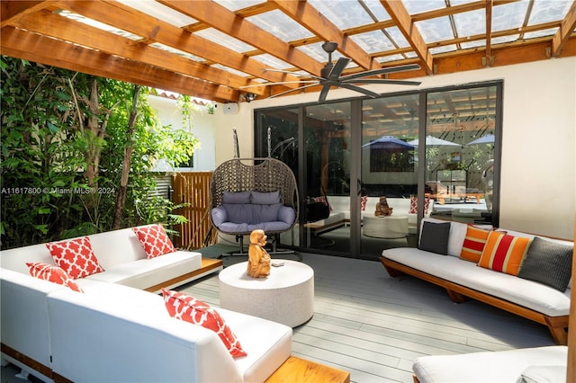 view of patio / terrace with ceiling fan, an outdoor hangout area, a deck, and a pergola