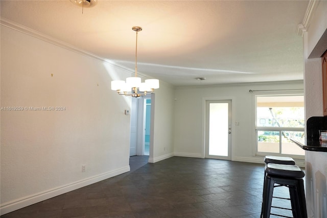 interior space with crown molding and an inviting chandelier