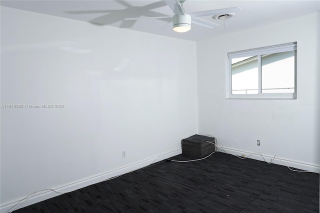 empty room featuring ceiling fan