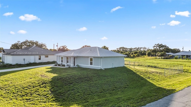 exterior space featuring a front lawn