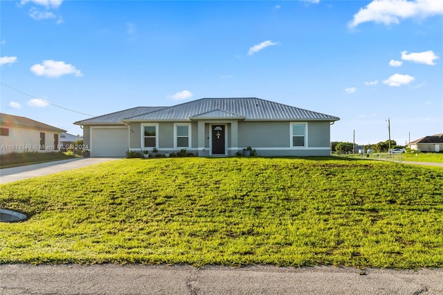 ranch-style home with a garage and a front yard