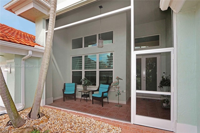 entrance to property with a patio