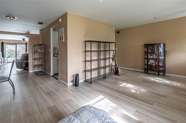 interior space featuring ceiling fan and hardwood / wood-style floors