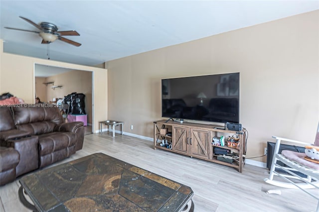 3991 NW 108th Ave, Coral Springs, FL 33065 - living room featuring a ceiling fan, wood finished floors, and baseboards