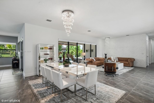 dining room with a chandelier