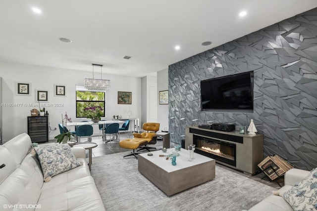 tiled living room with a fireplace, wine cooler, and tile walls