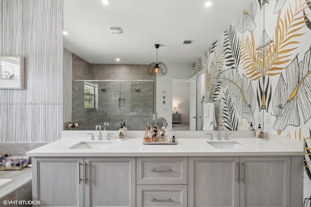 bathroom with vanity and walk in shower