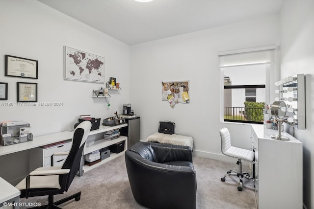 view of carpeted office space