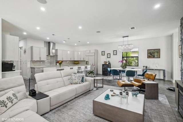 living room featuring an inviting chandelier