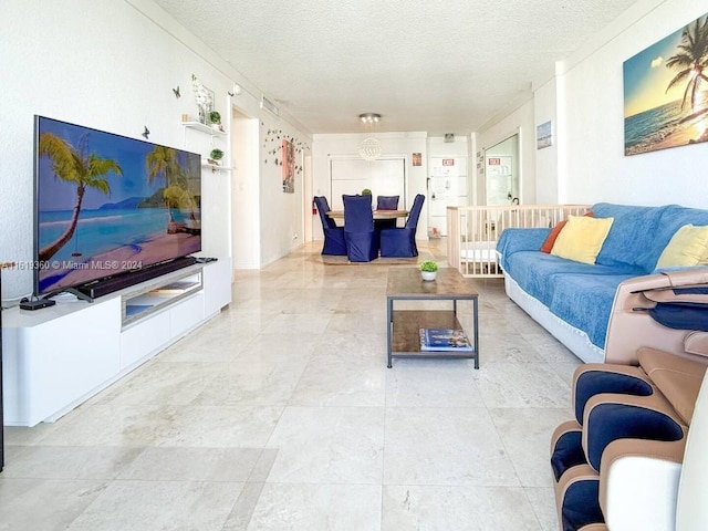 living room with a textured ceiling