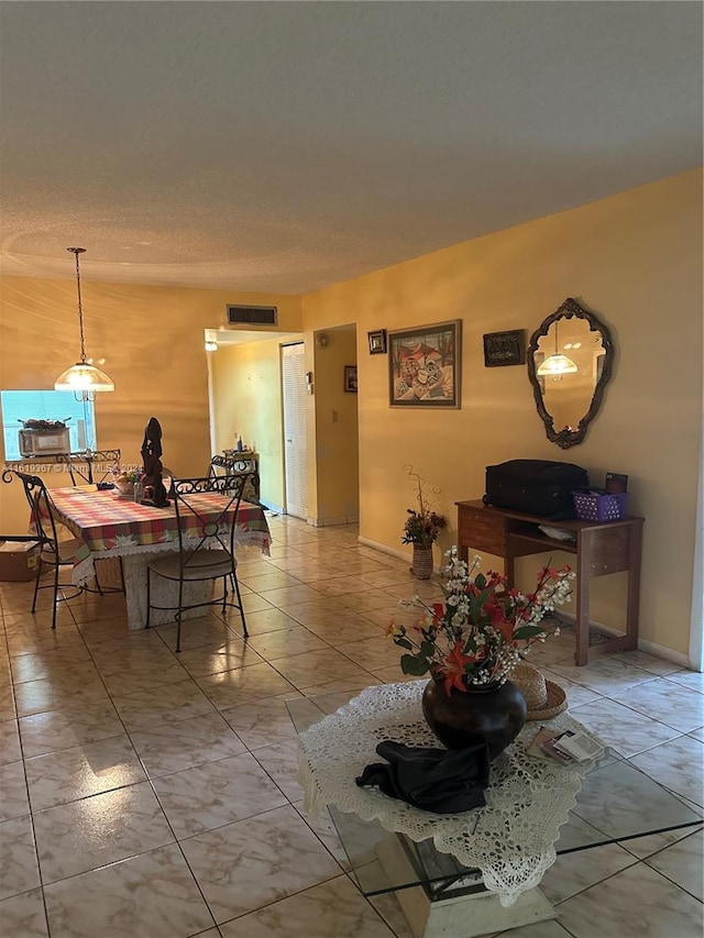 5945 Del Lago Cir Unit 201, Sunrise, FL 33313 - dining area with baseboards and visible vents