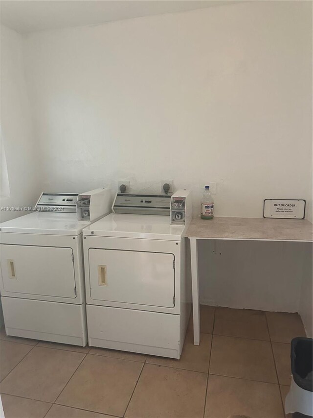 5945 Del Lago Cir Unit 201, Sunrise, FL 33313 - clothes washing area with light tile patterned floors and independent washer and dryer