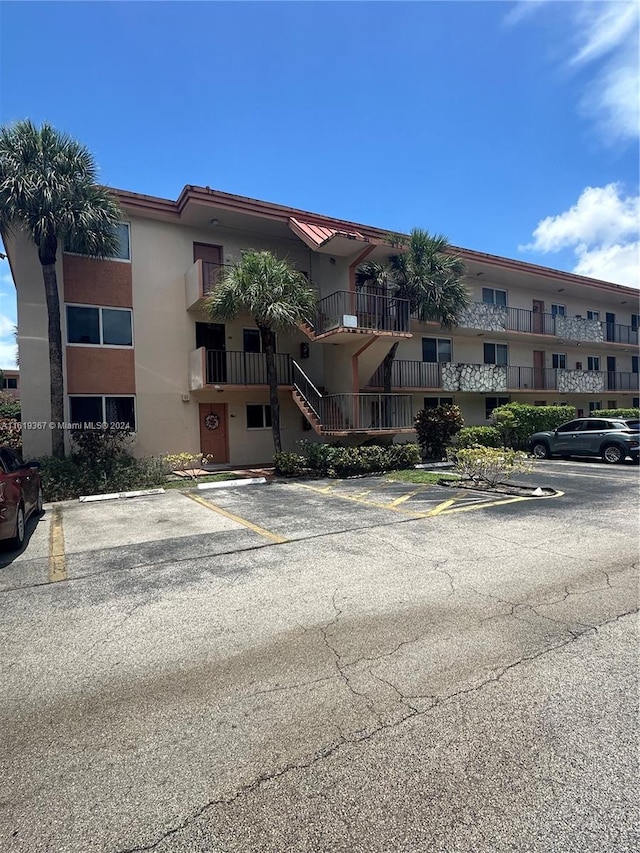 5945 Del Lago Cir Unit 201, Sunrise, FL 33313 - view of property with uncovered parking
