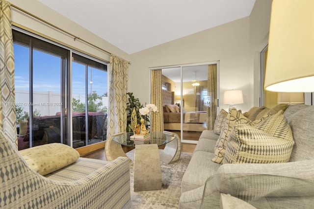 living area with vaulted ceiling