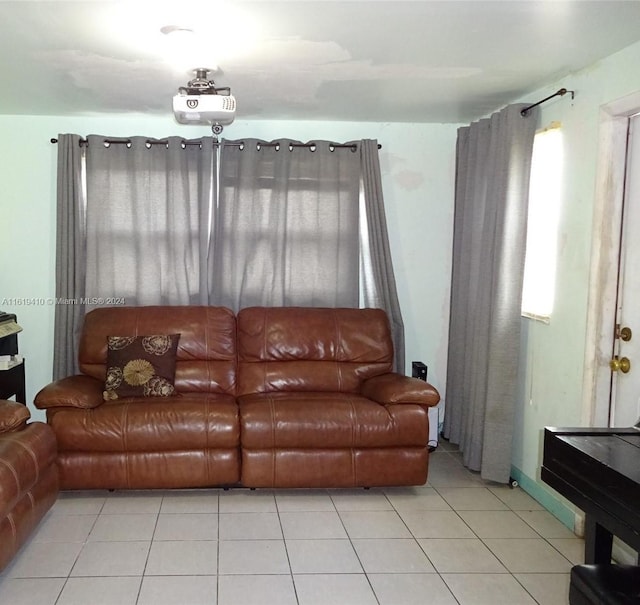 living room with tile patterned floors