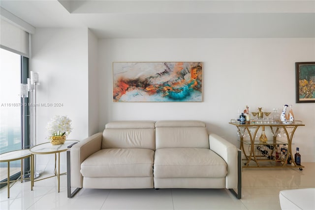 living room featuring tile patterned flooring