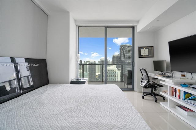 bedroom with a wall of windows, access to exterior, and light tile patterned floors