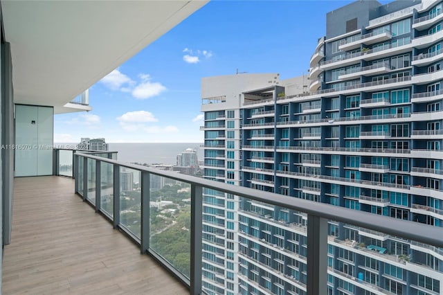 balcony featuring a water view