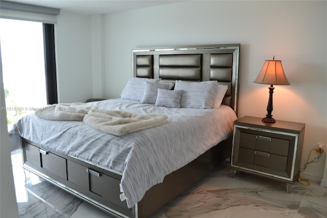 bedroom featuring multiple windows