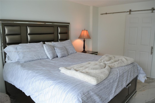 bedroom with a barn door