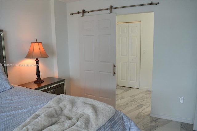 bedroom with a barn door