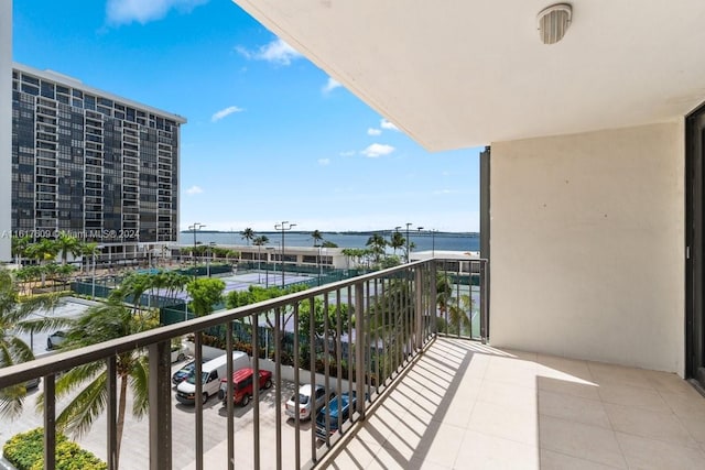 balcony featuring a water view