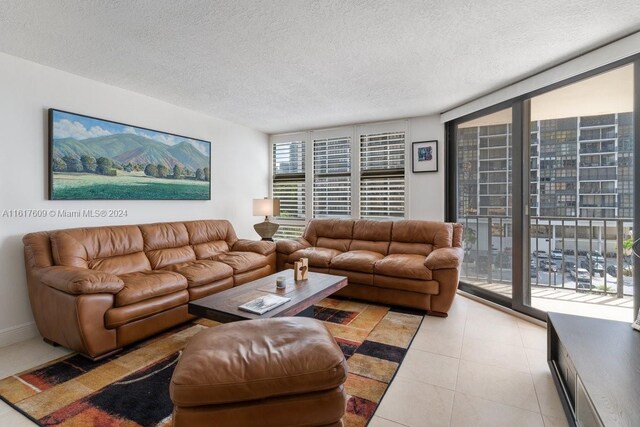 1915 Brickell Ave Unit C506, Miami, FL 33129 - living area with a textured ceiling