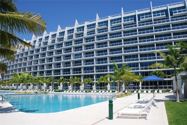 view of swimming pool with a water view