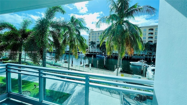 view of pool with a water view