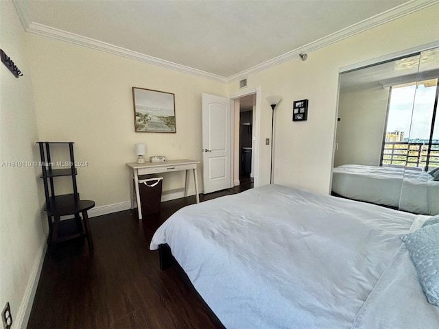 bedroom with dark wood-type flooring and ornamental molding