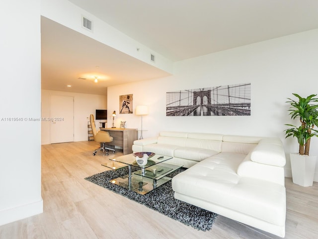 living room with light hardwood / wood-style floors