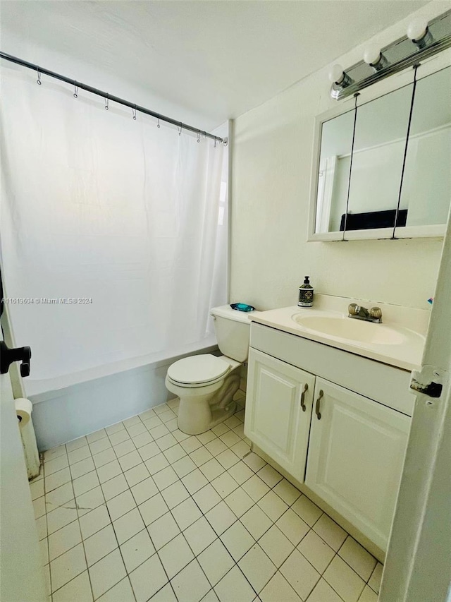 full bathroom with vanity, tile patterned flooring, shower / bath combination with curtain, and toilet