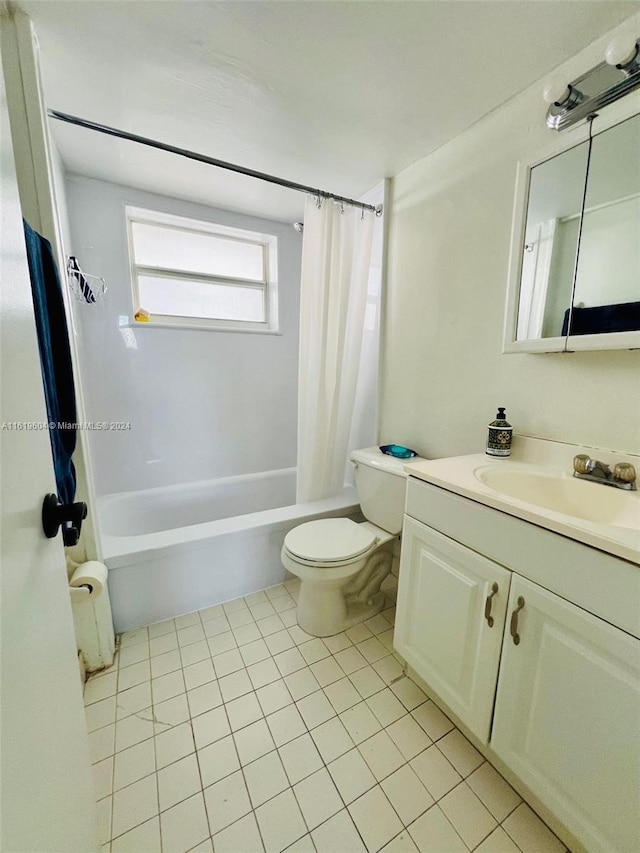 full bathroom with vanity, shower / bathtub combination with curtain, tile patterned floors, and toilet