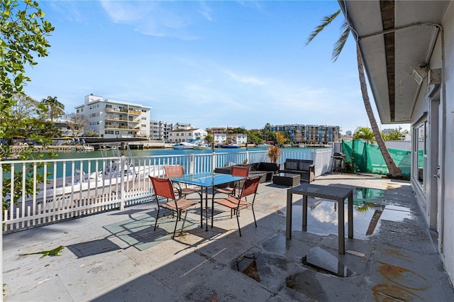 view of patio / terrace with a water view